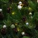 closeup photo of Christmas tree with ornament and lighted lights